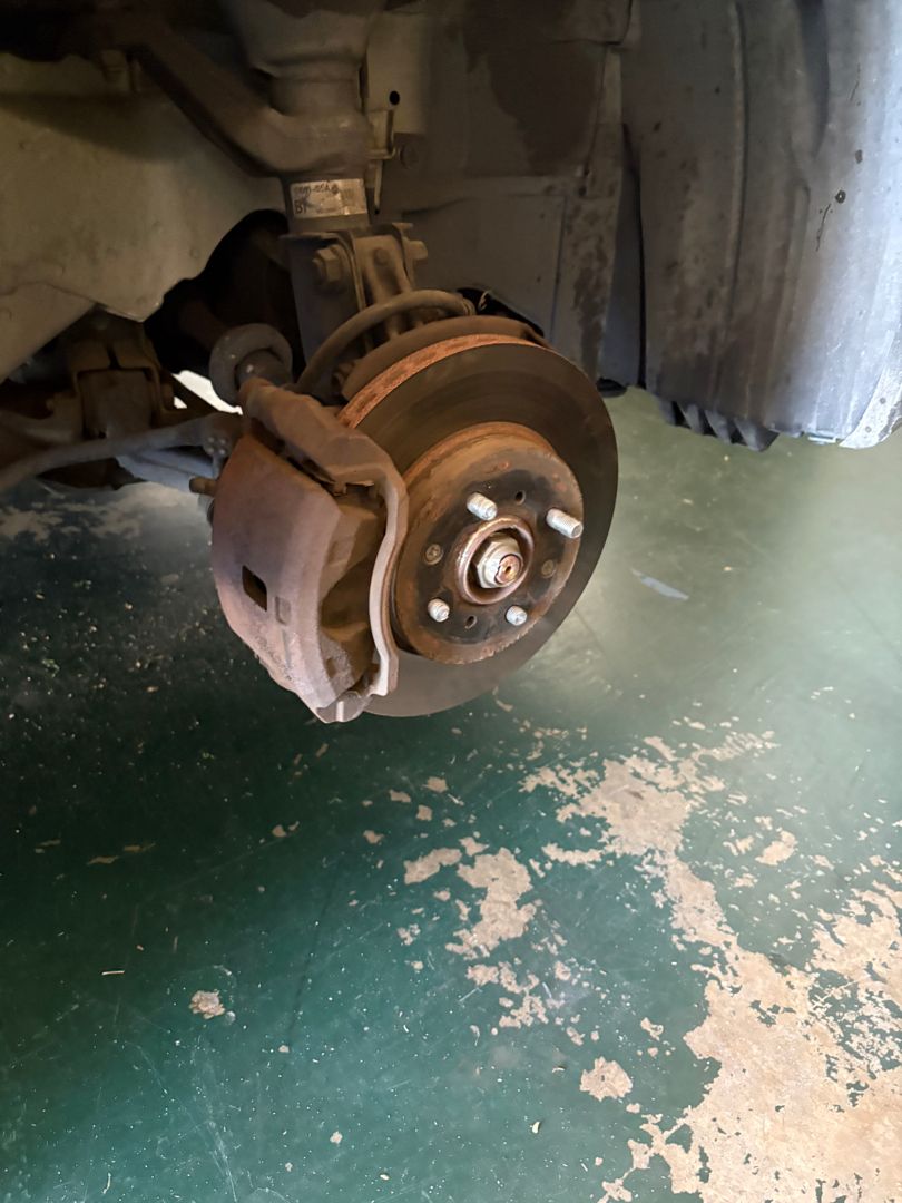 A brake rotor past its service limit