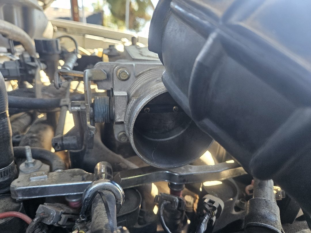 Throttle body service in progress