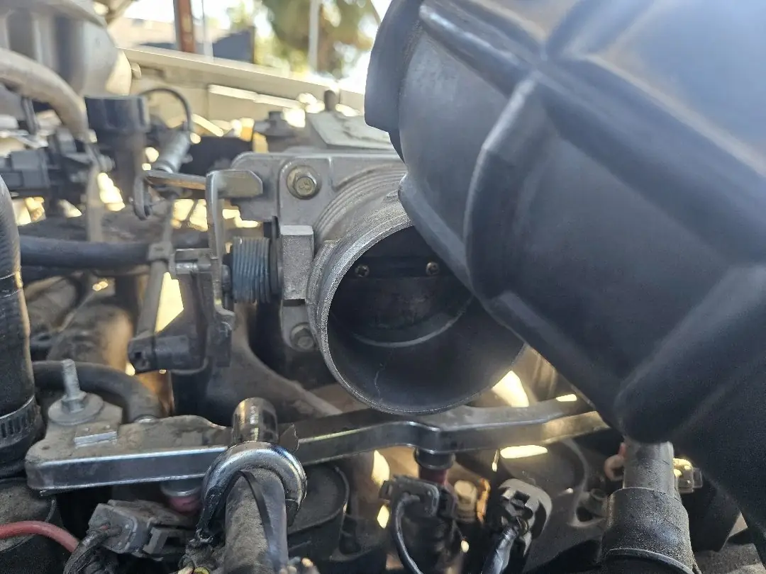 Throttle body service in progress